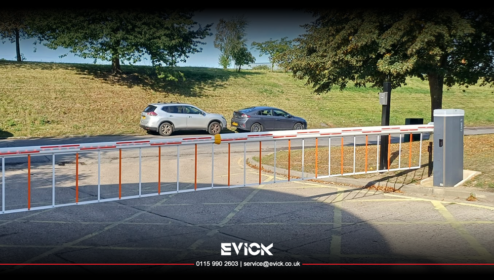 Automatic car park barrier with pedestrian skirt