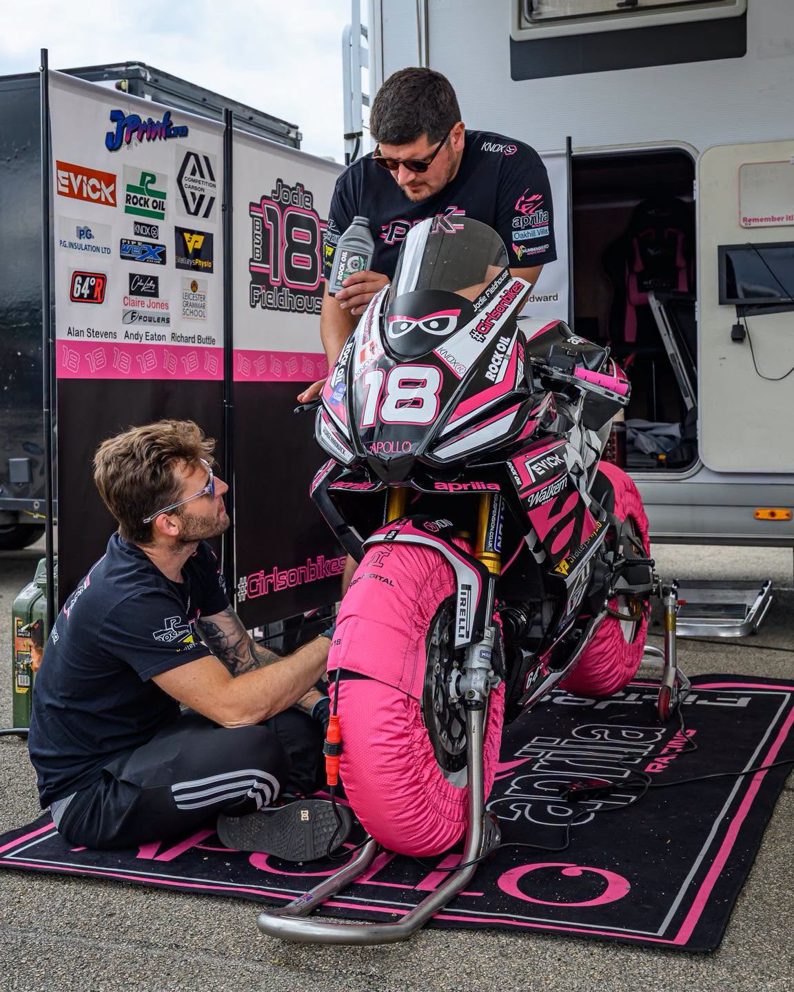 Go Pink Racing team preparing Jodie Fieldhouse number 18 motorcycle